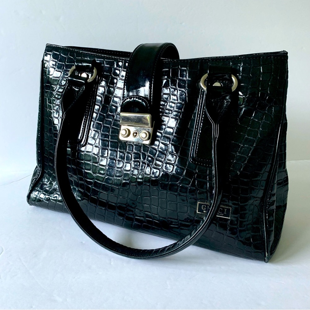 Authentic Gucci mini purse black crocodile print locking purse suede lining